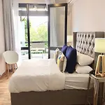Urban Oasis At Windburg Suites